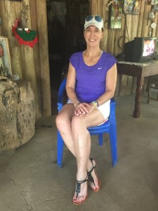 The author sits in Panchita’s favorite plastic blue chair on the insistence of Panchita’s granddaughter, Magdalena, that it might provide good luck with the author’s own longevity.